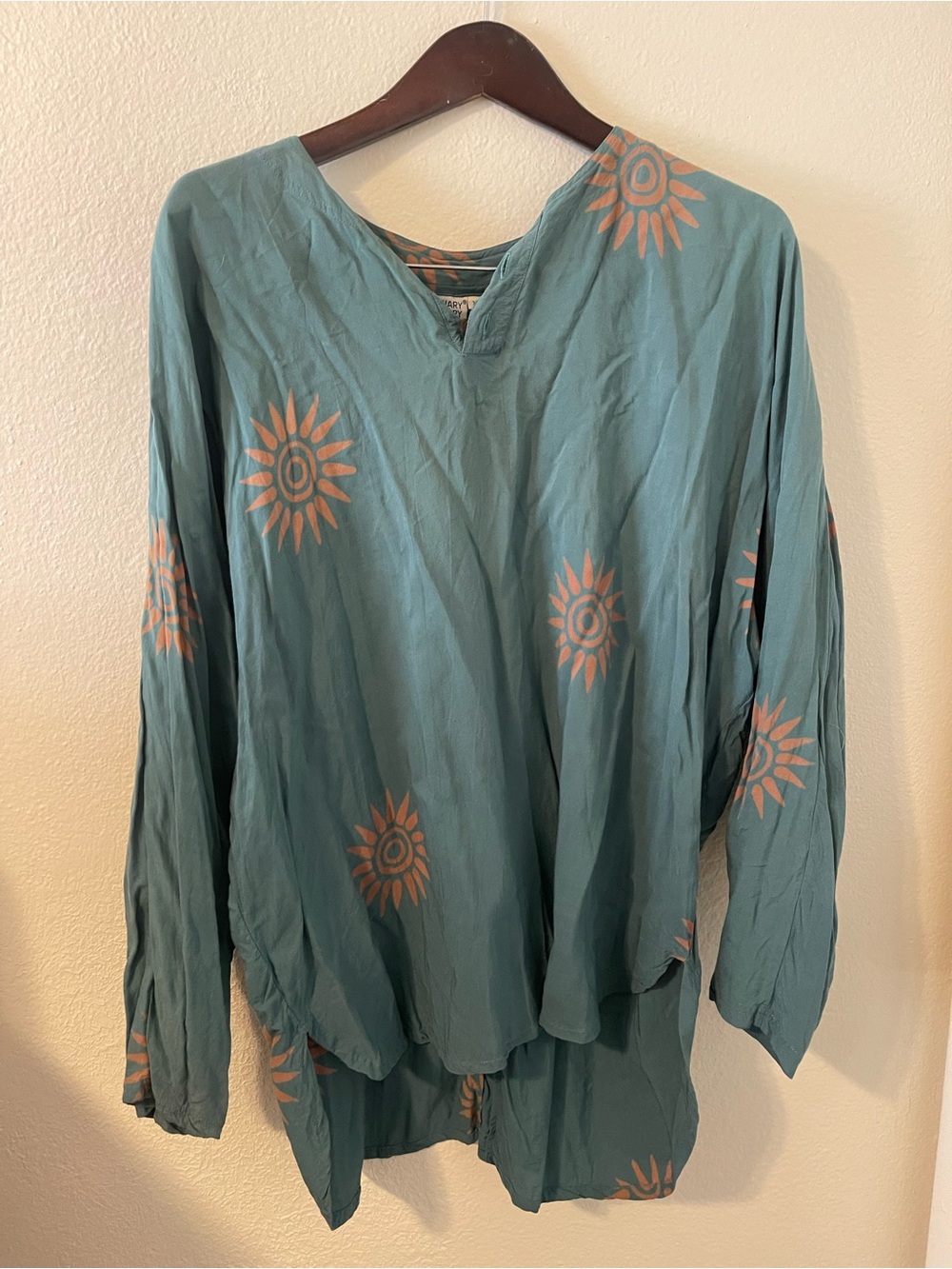 Boho V-Neck Womenโs Top in Teal with Peach/Gold Sun Print